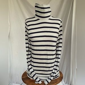 Turtleneck. 100% cotton